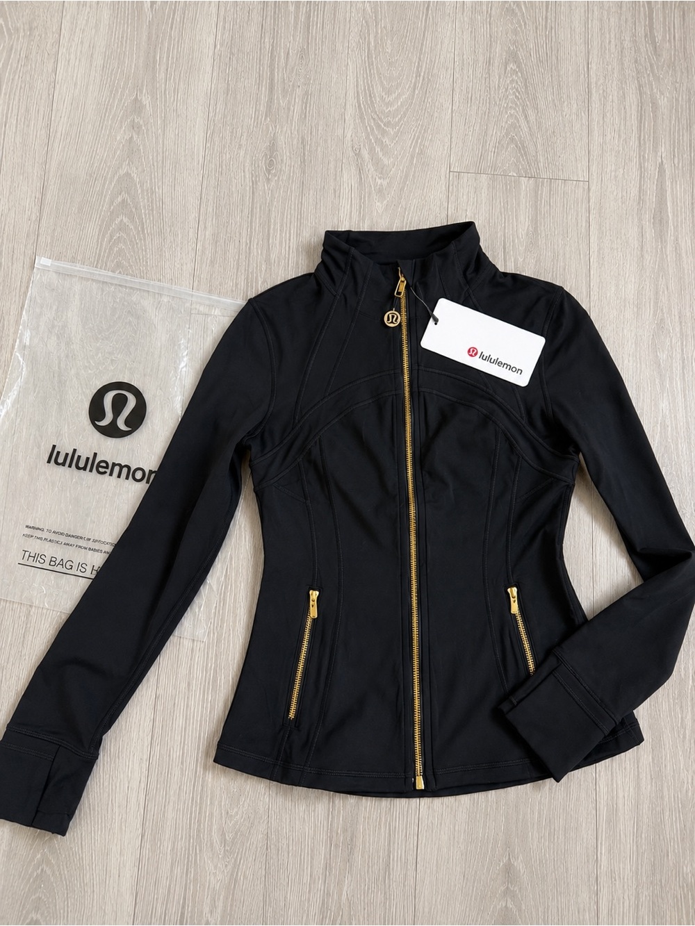 lululemon athletica Black Jacket with Gold Zippers